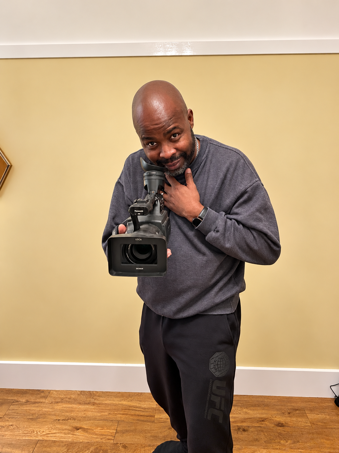 Kunle Odunewu with a Panasonic video camera